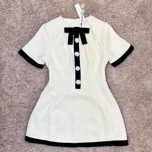 Classic Ivory Mini Dress with Black Trim and Bow
